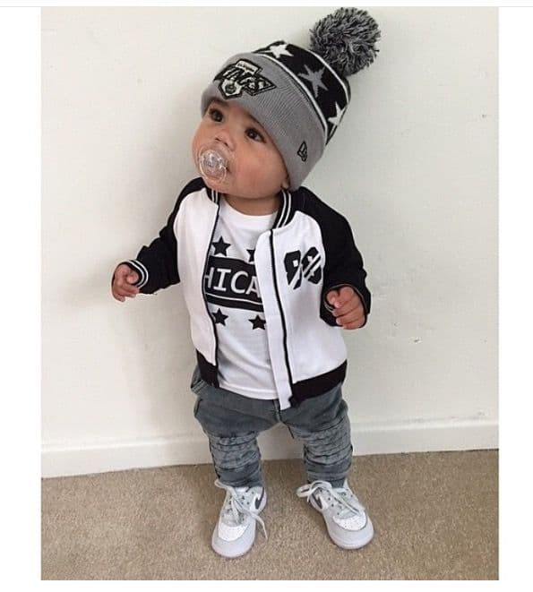 Child in white dress and straw hat
