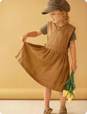 Child in brown dress